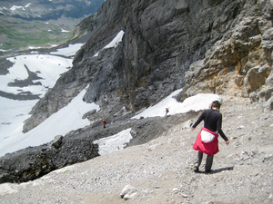 Three descending the scree ramp.